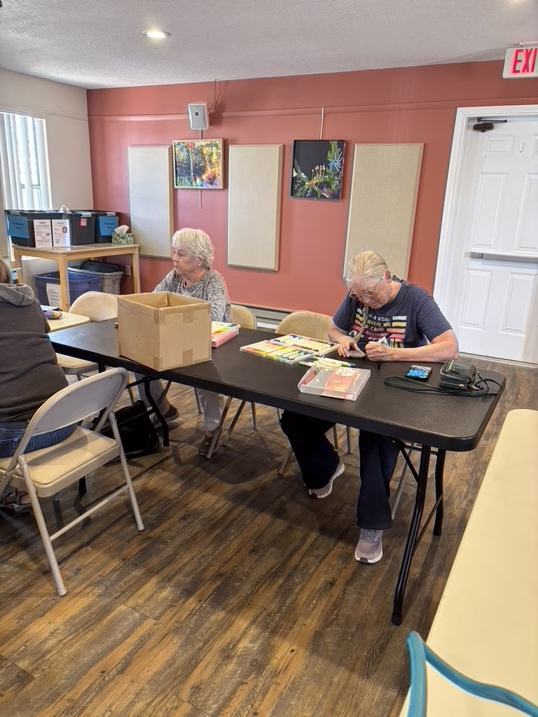 Women's Group paint Peace Rocks